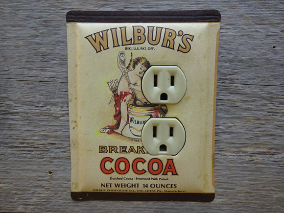 Outlet Covers Made From Wilburs Cocoa Tins