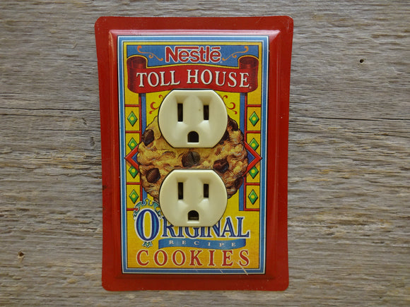 Colorful Outlet Covers Made From Toll House Cookies Tins