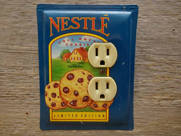Outlet Cover Made From A Nestle Toll House Cookie Tin