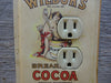Outlet Covers Made From Wilburs Cocoa Tins