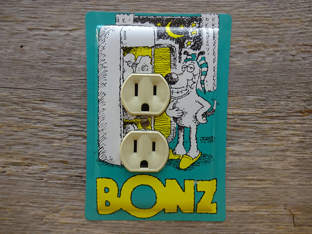Outlet Covers Made From Bonz Dog Treats Tins